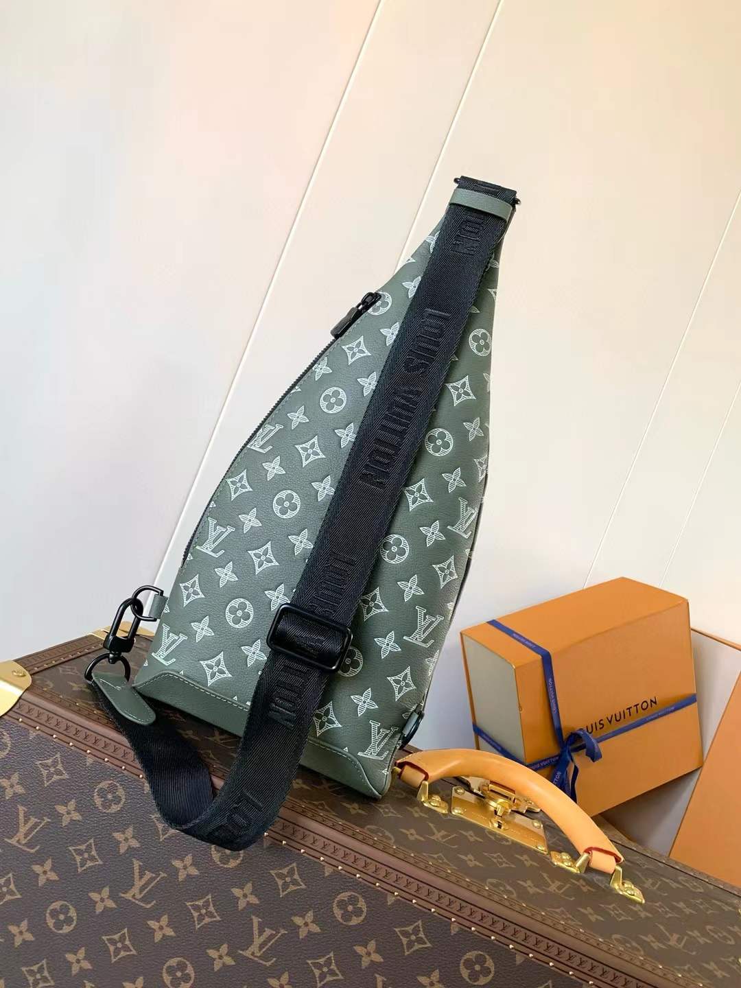 LV Duo Slingbag in the Monogram Shadow leather material and green color