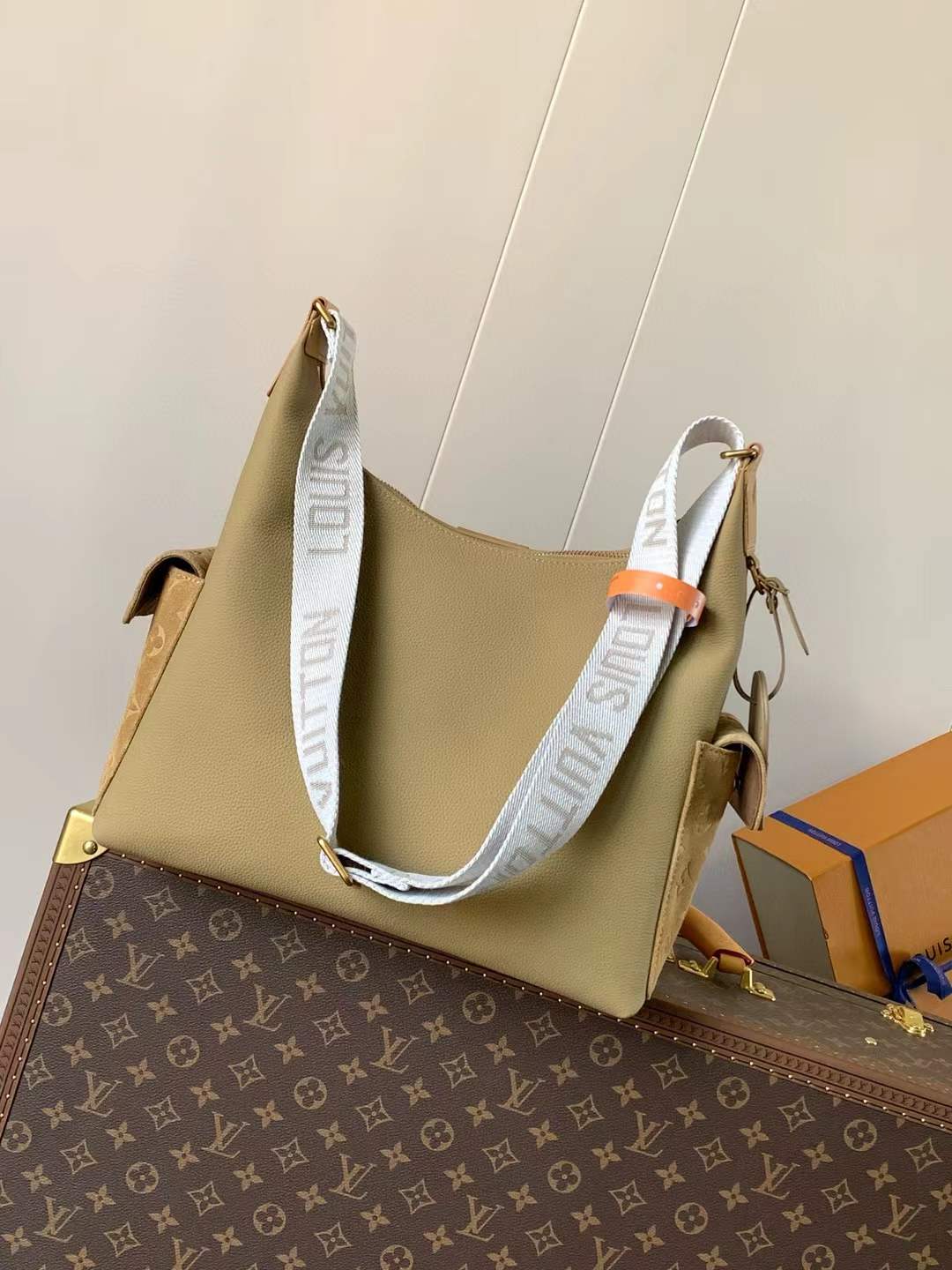 LV Grained Cowhide Monogram Hobo Cargo bag in beige
