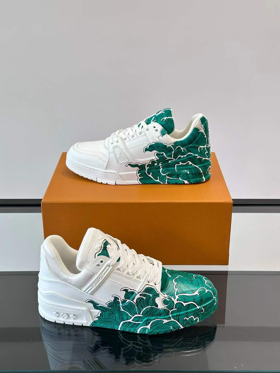LV low-top Trainer sneaker with a green and white artistic design