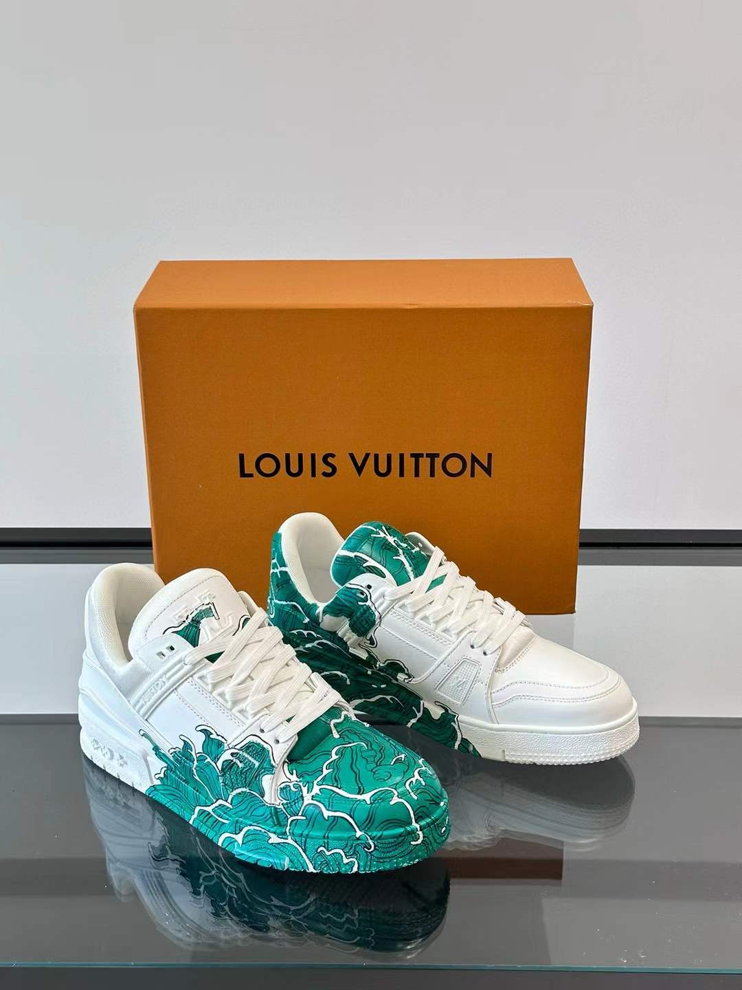 LV low-top Trainer sneaker with a green and white artistic design
