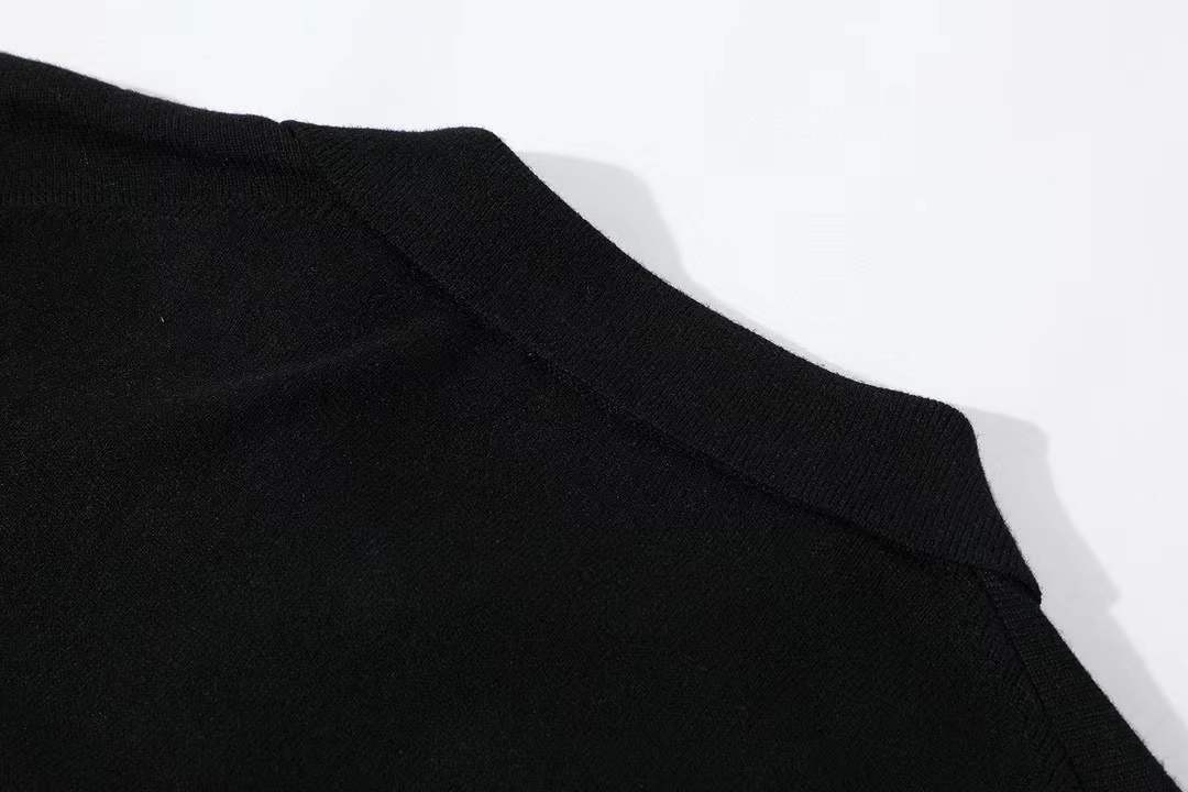 Miu Miu virgin wool long-sleeved polo sweater in black