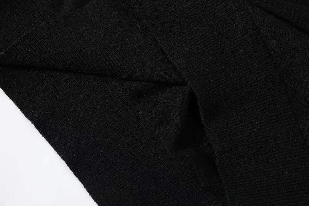 Miu Miu virgin wool long-sleeved polo sweater in black