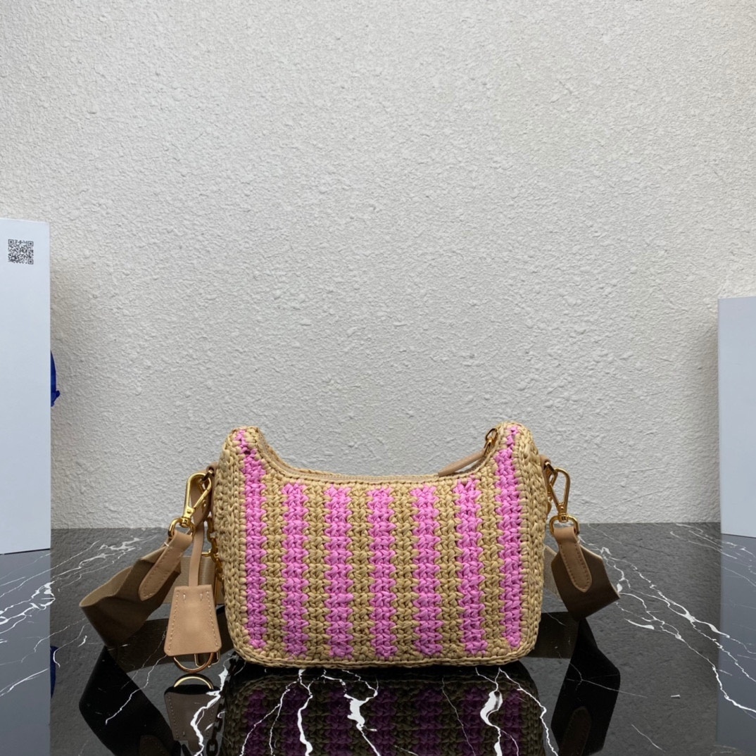 Prada Re-Edition 2005 shoulder bag in pink and beige striped raffia with a gold chain strap