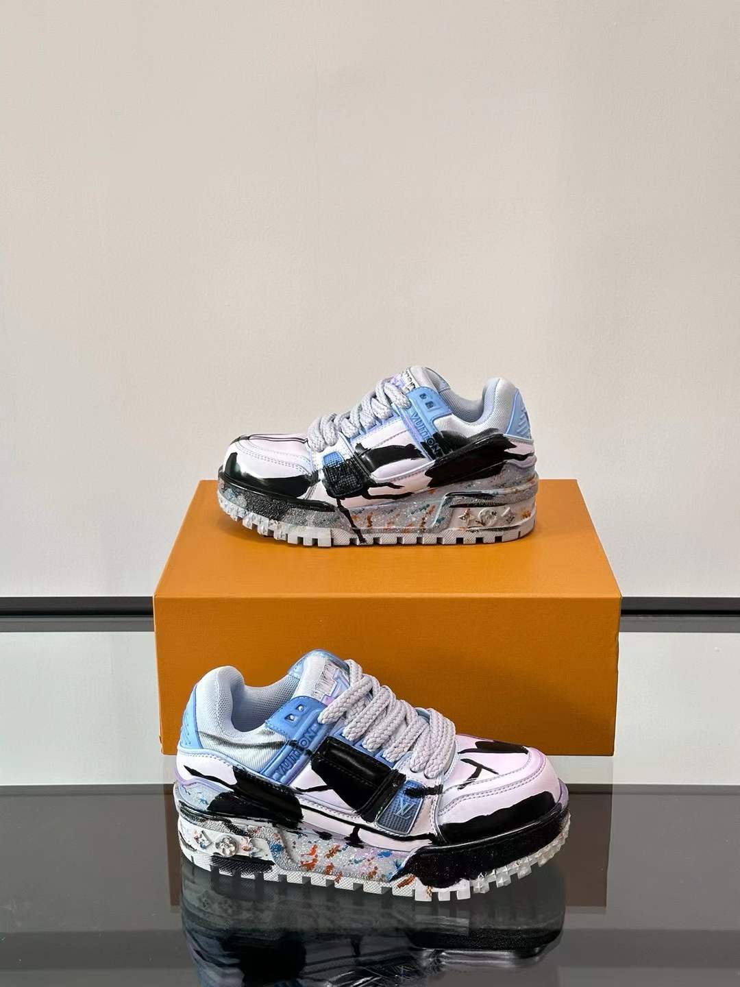 LV Trainer sneakers with a custom "paint splatter" design