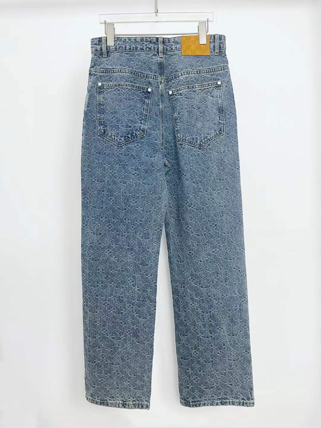 LV Regular Denim Pants in a stone-washed blue color.