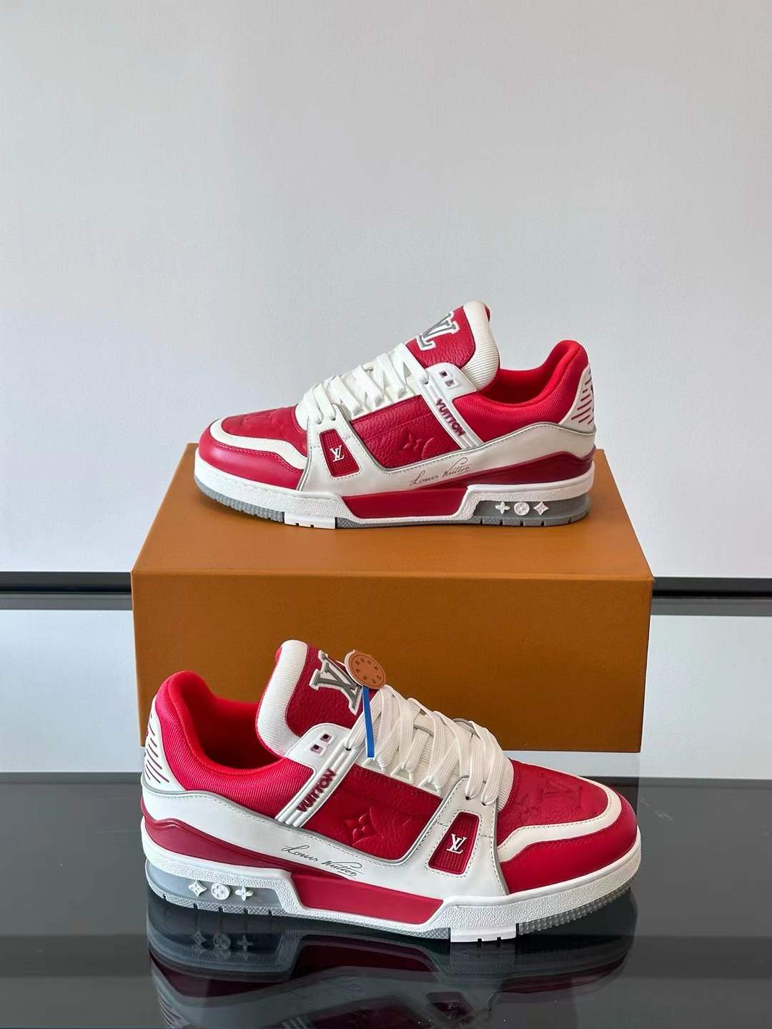 LV Trainer sneaker in a red and white colorway