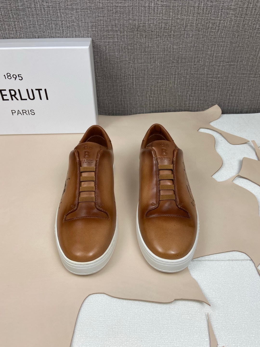 Berluti Playtime slip-on sneaker in brown Venezia leather with Scritto calligraphy
