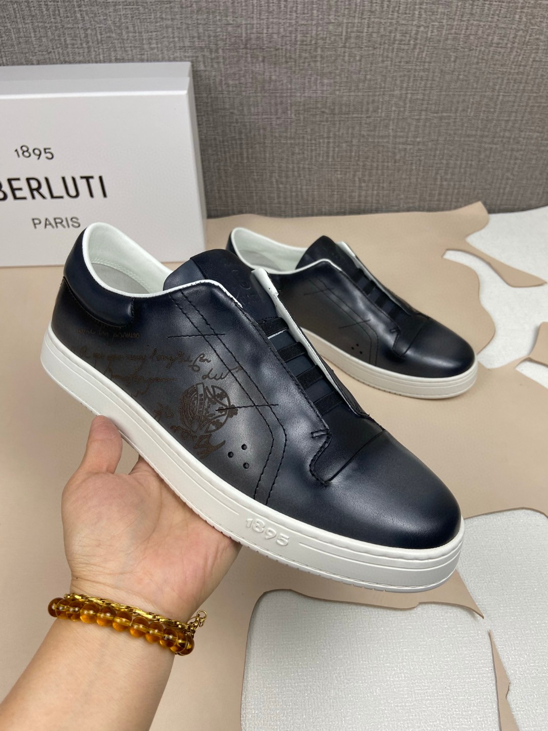 Berluti Playtime Scritto Venezia leather slip-on sneakers in black