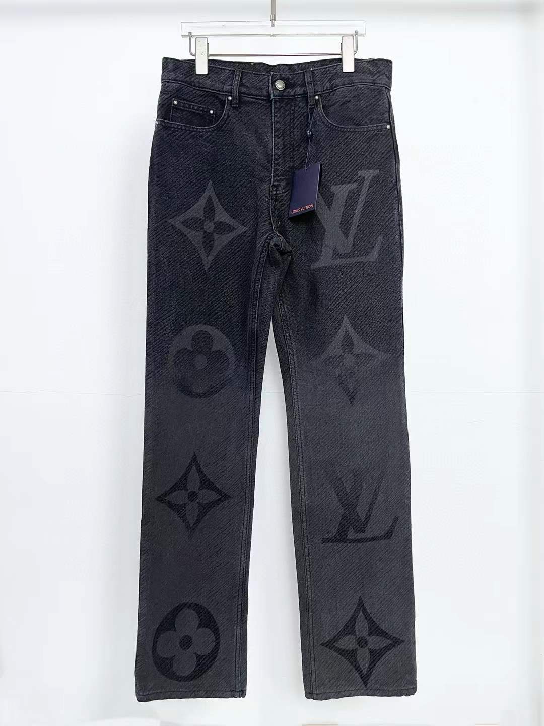 LV Monogram Denim Pants in a washed black color with a dark-to-light gradient effect