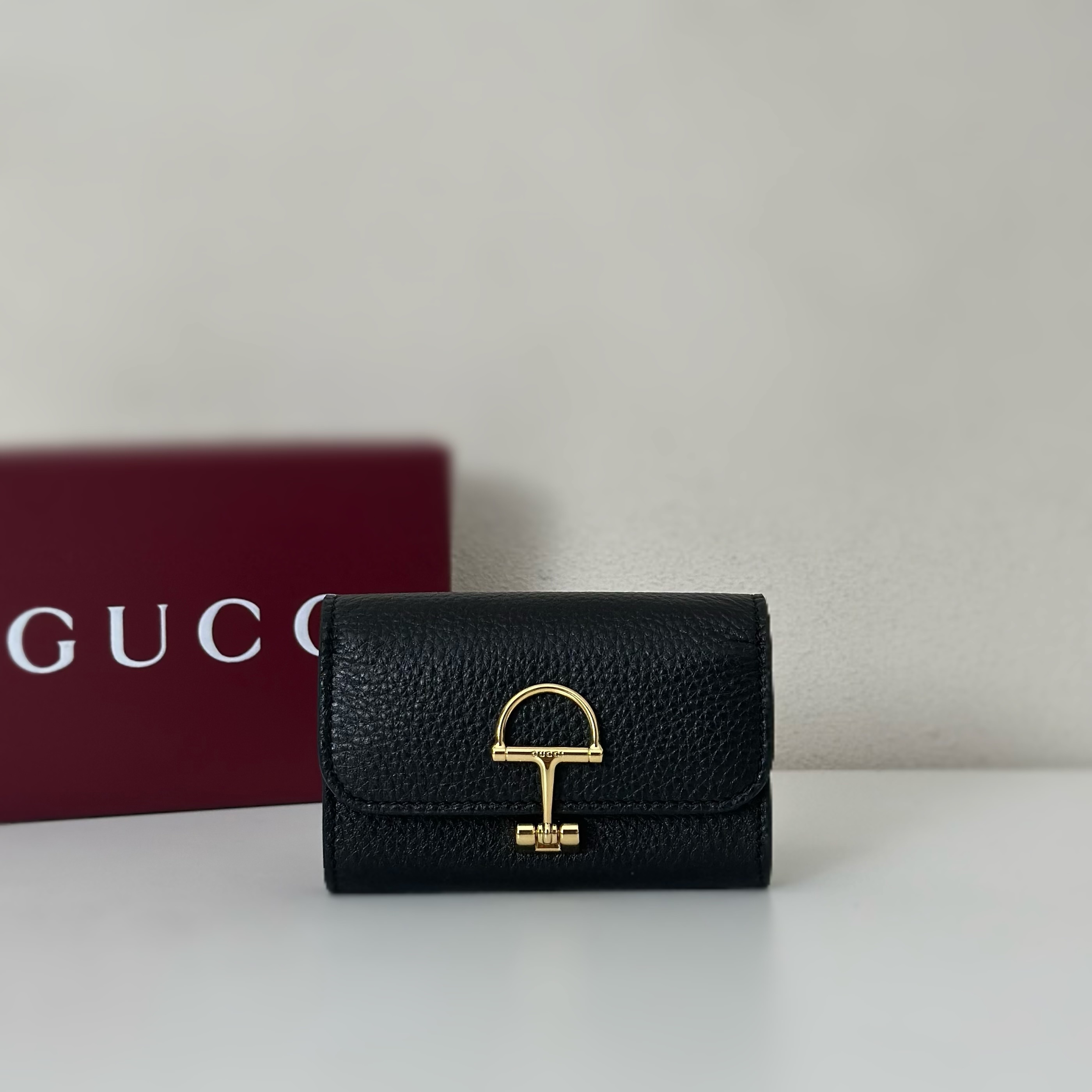 Gucci Softbit card case in black grainy leather with gold-toned hardware