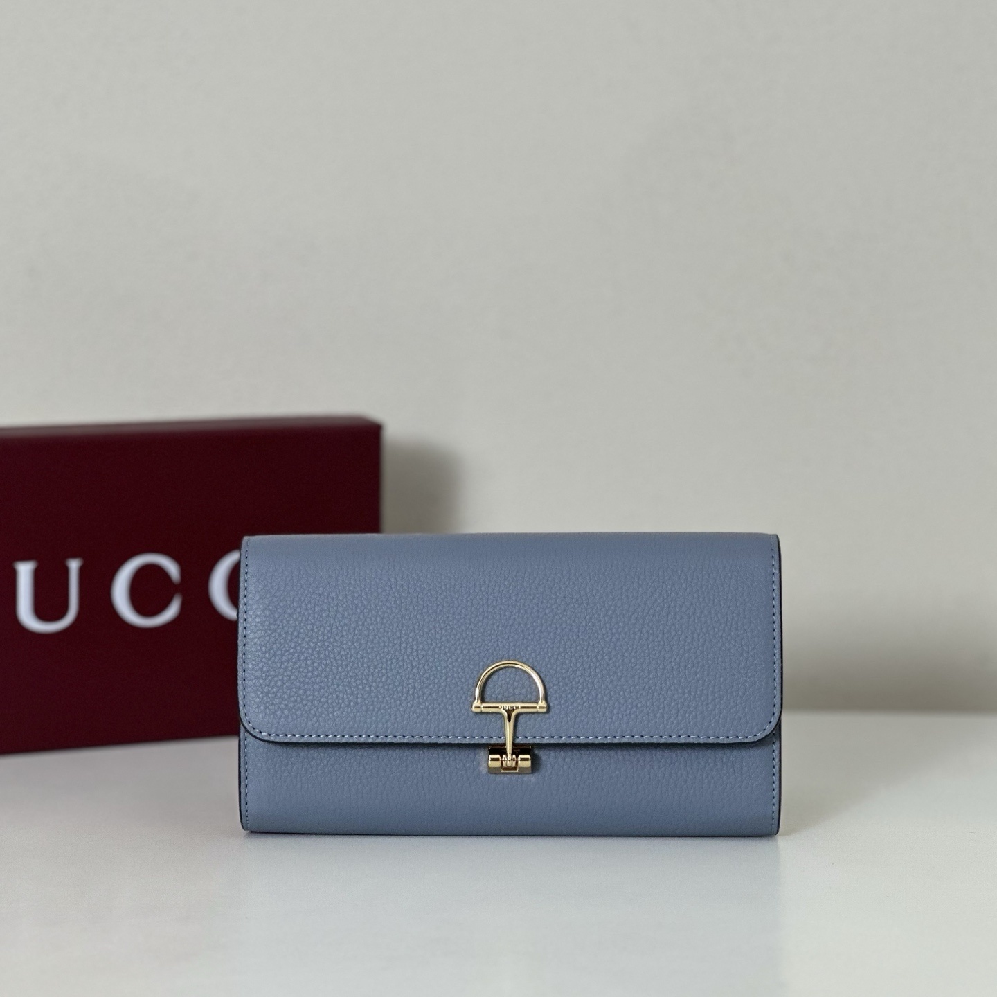 Gucci Softbit continental wallet in a light blue grainy leather with gold-toned hardware