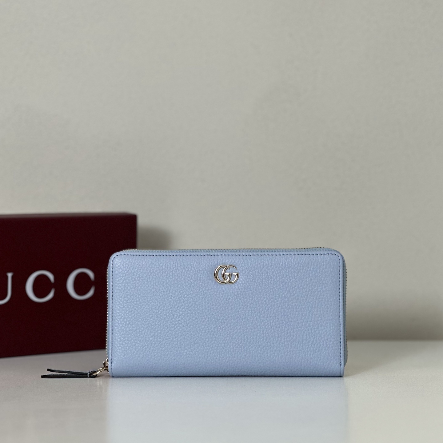 Gucci GG Marmont zip-around long wallet in light blue or cornflower blue leather