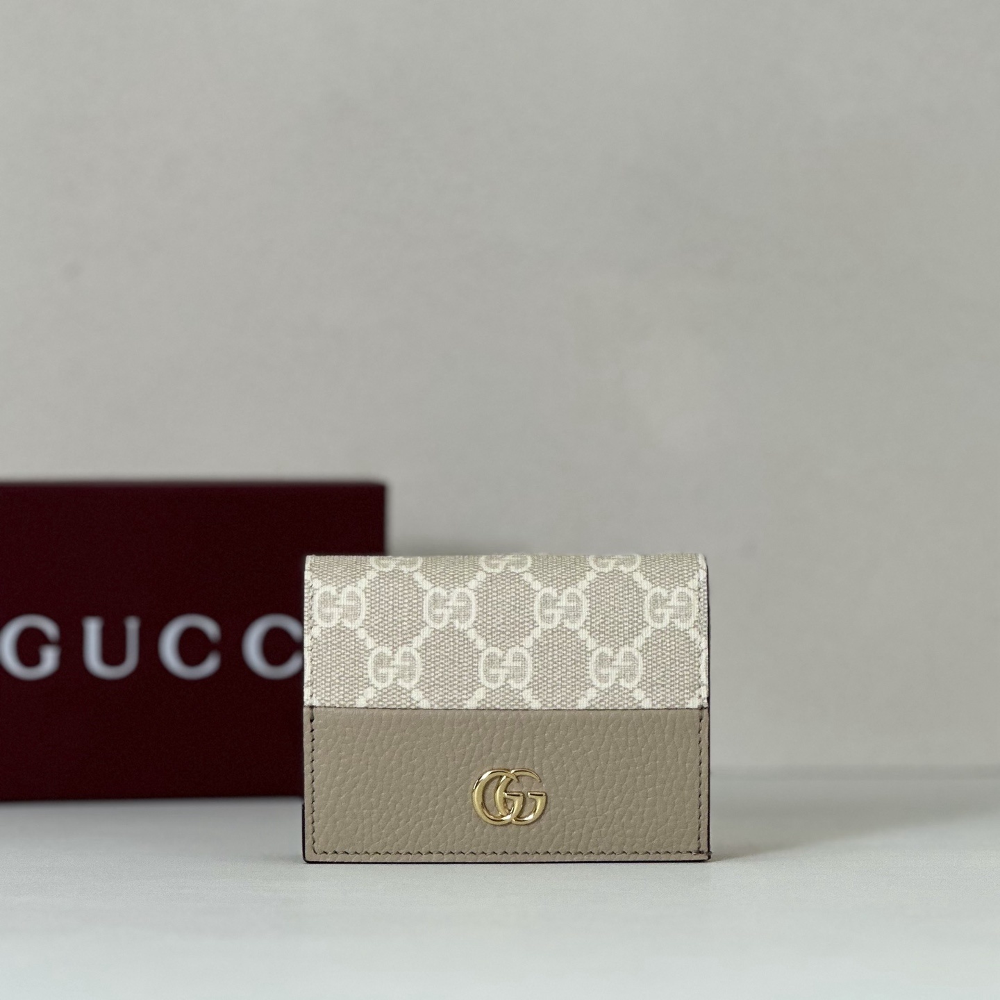 Gucci GG Marmont compact wallet in GG Supreme canvas and leather