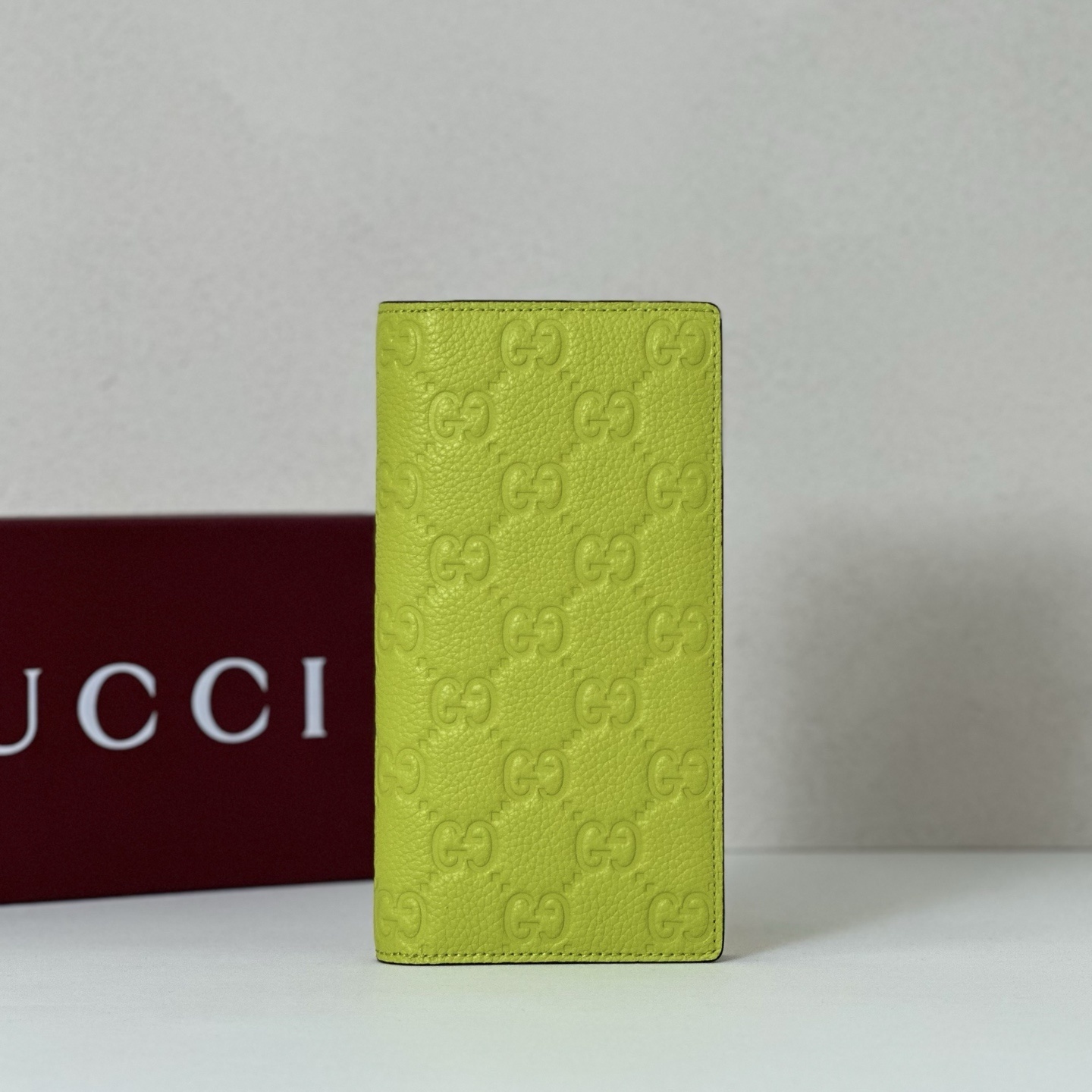 Gucci monogram green leather bifold wallet