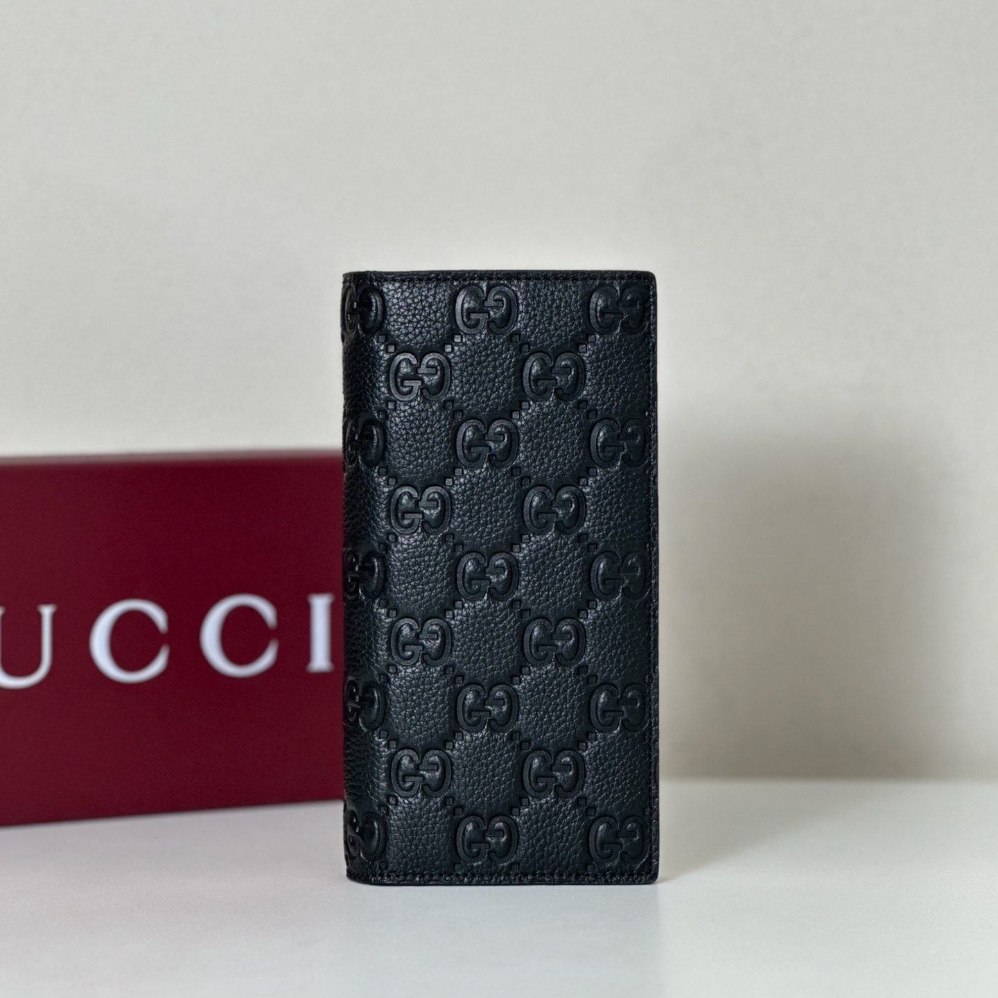Gucci Imprint long wallet in black embossed leather