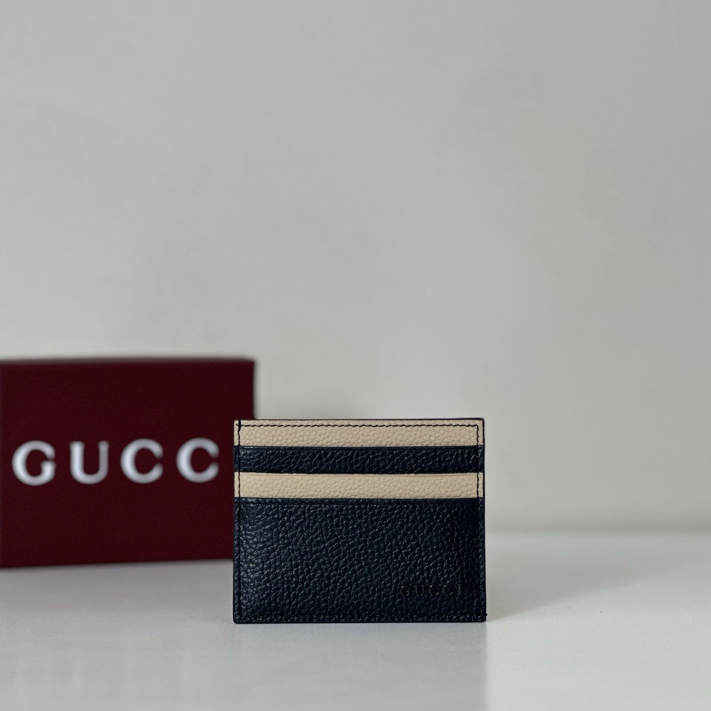 Gucci bi-color card case wallet in black and beige leather