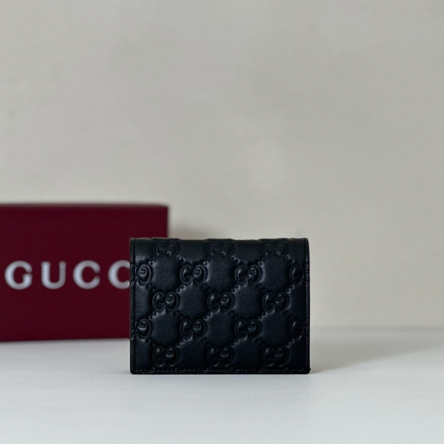 Gucci black leather bifold wallet in Guccissima leather