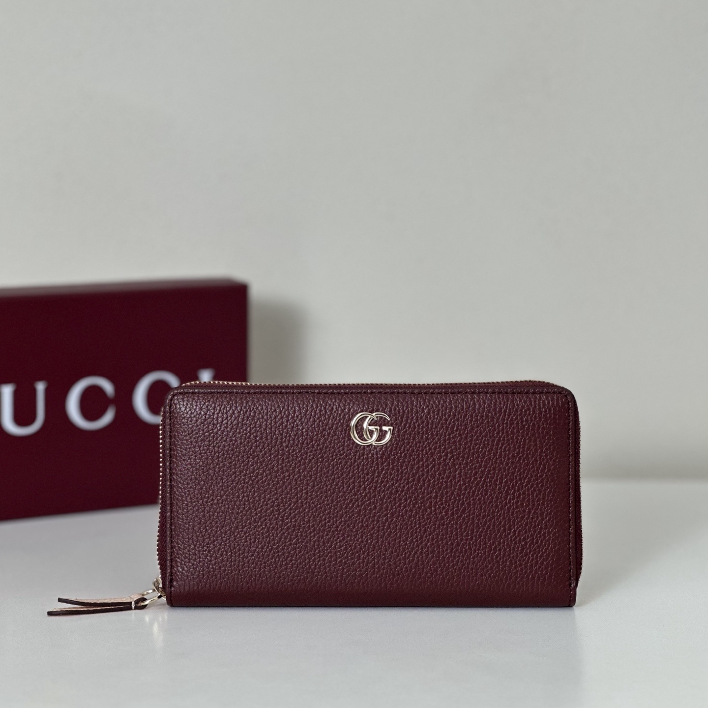Gucci GG Marmont Continental Wallet in a burgundy or red textured leather