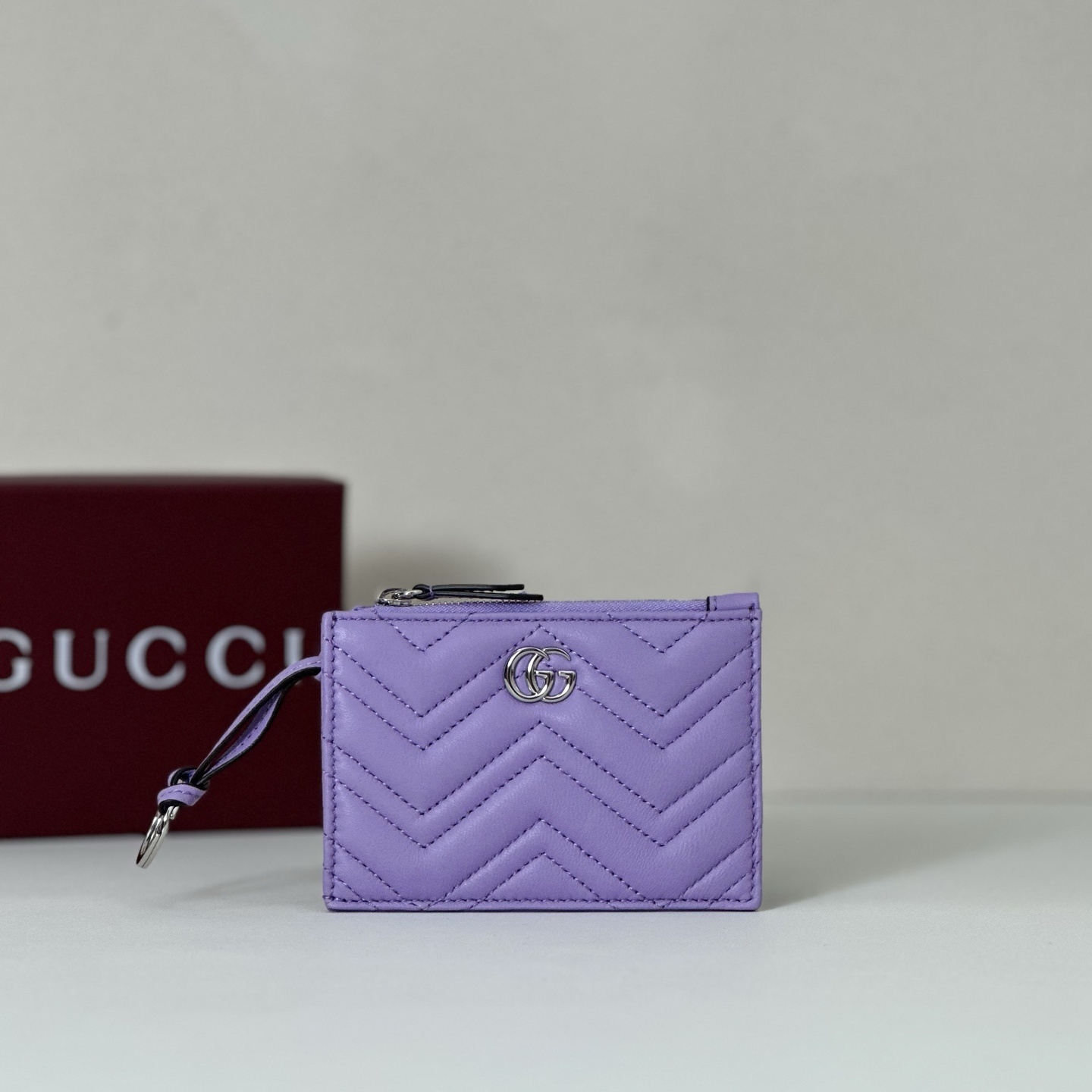 Gucci GG Marmont small matelassé leather wallet in a purple or lilac color