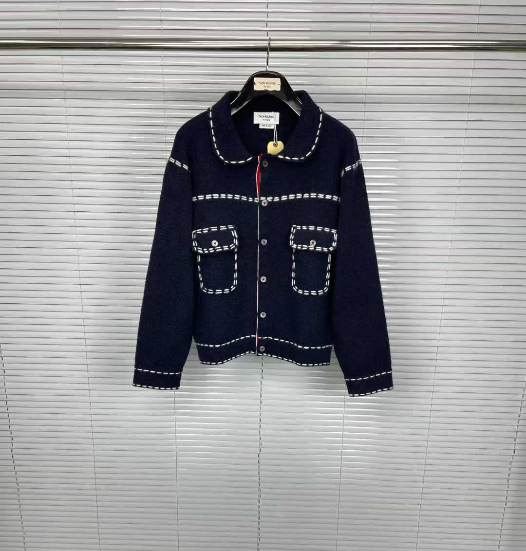 Thom Browne navy blue cardigan with white stitching