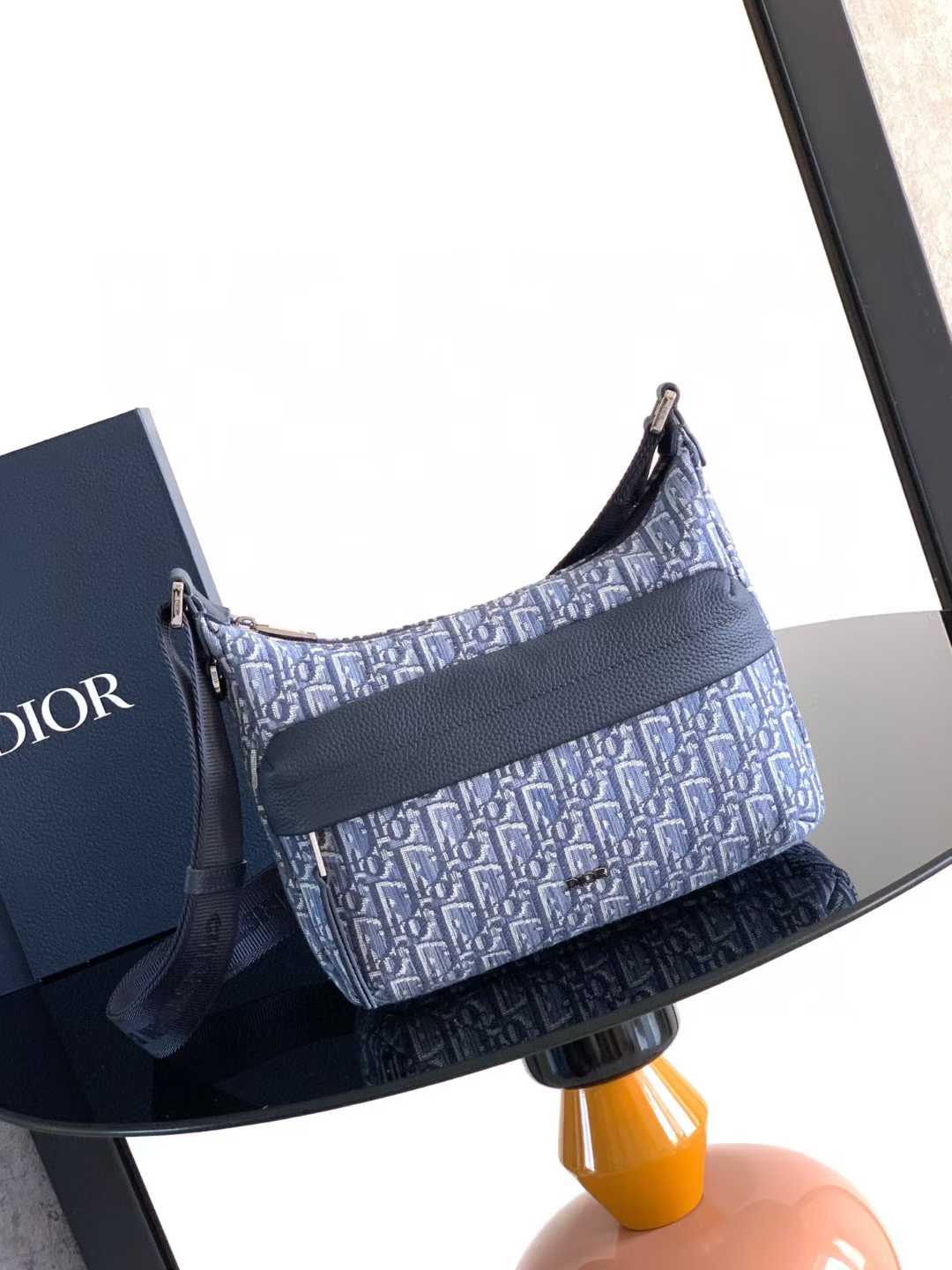 Dior Medium Rider Soft Hobo Bag in blue Dior Oblique jacquard and blue grained calfskin.