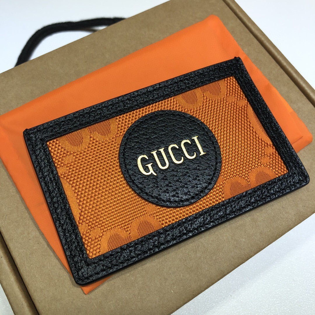 Gucci Off The Grid card case in orange and black