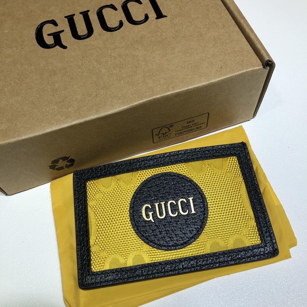 Gucci Off The Grid GG card holder in yellow