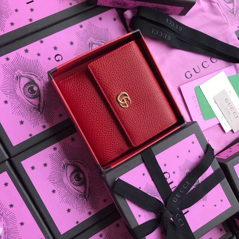 Gucci GG Marmont Tri-fold Wallet in red pebbled leather
