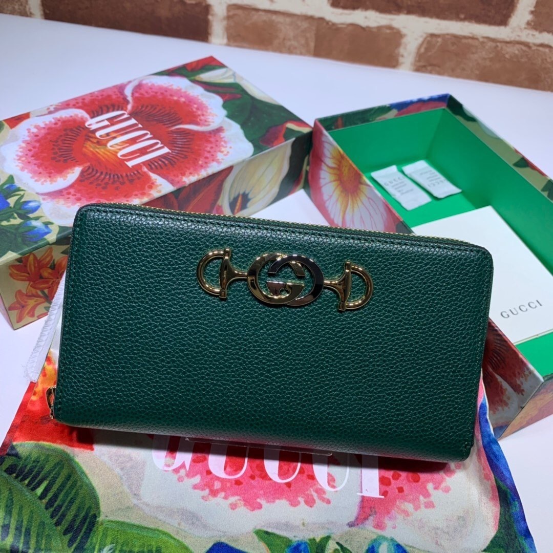 Gucci Zumi grainy leather zip around wallet in a dark green color