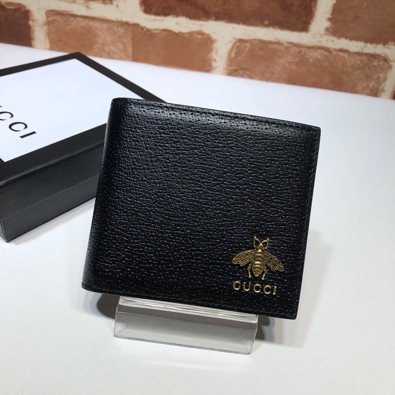 Gucci Animalier leather bi-fold wallet in black, featuring a metal bee detail