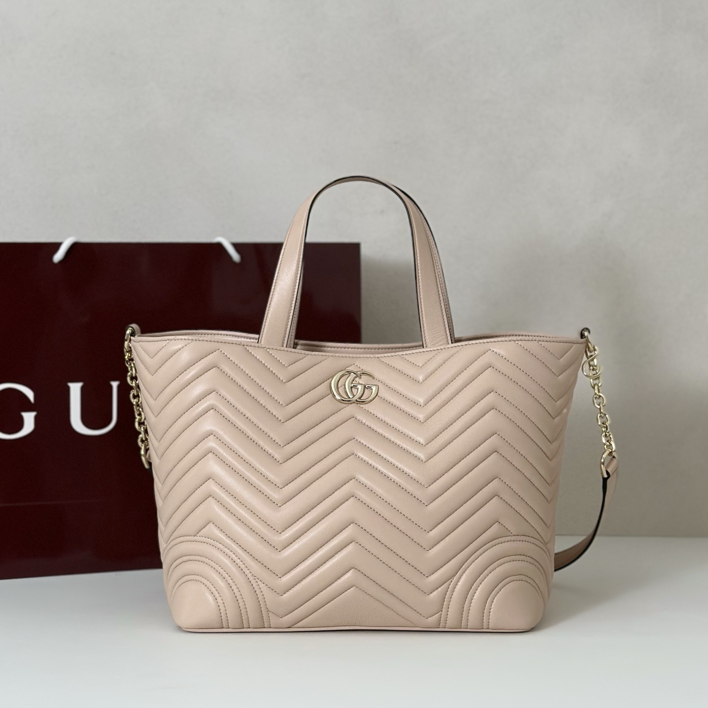 Gucci Neutral GG Marmont Matelasse Leather Tote Bag in pale pink matelassé chevron lambskin leather with light gold-toned hardware