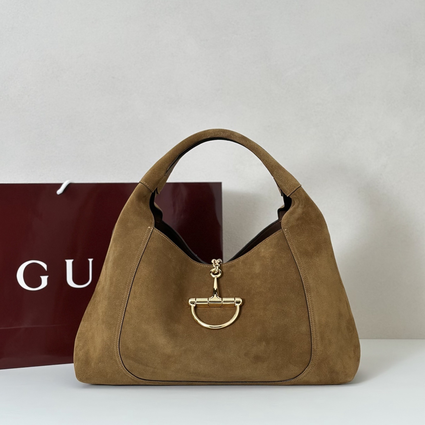 Gucci Softbit Maxi shoulder bag in brown suede with gold-toned Half Horsebit hardware