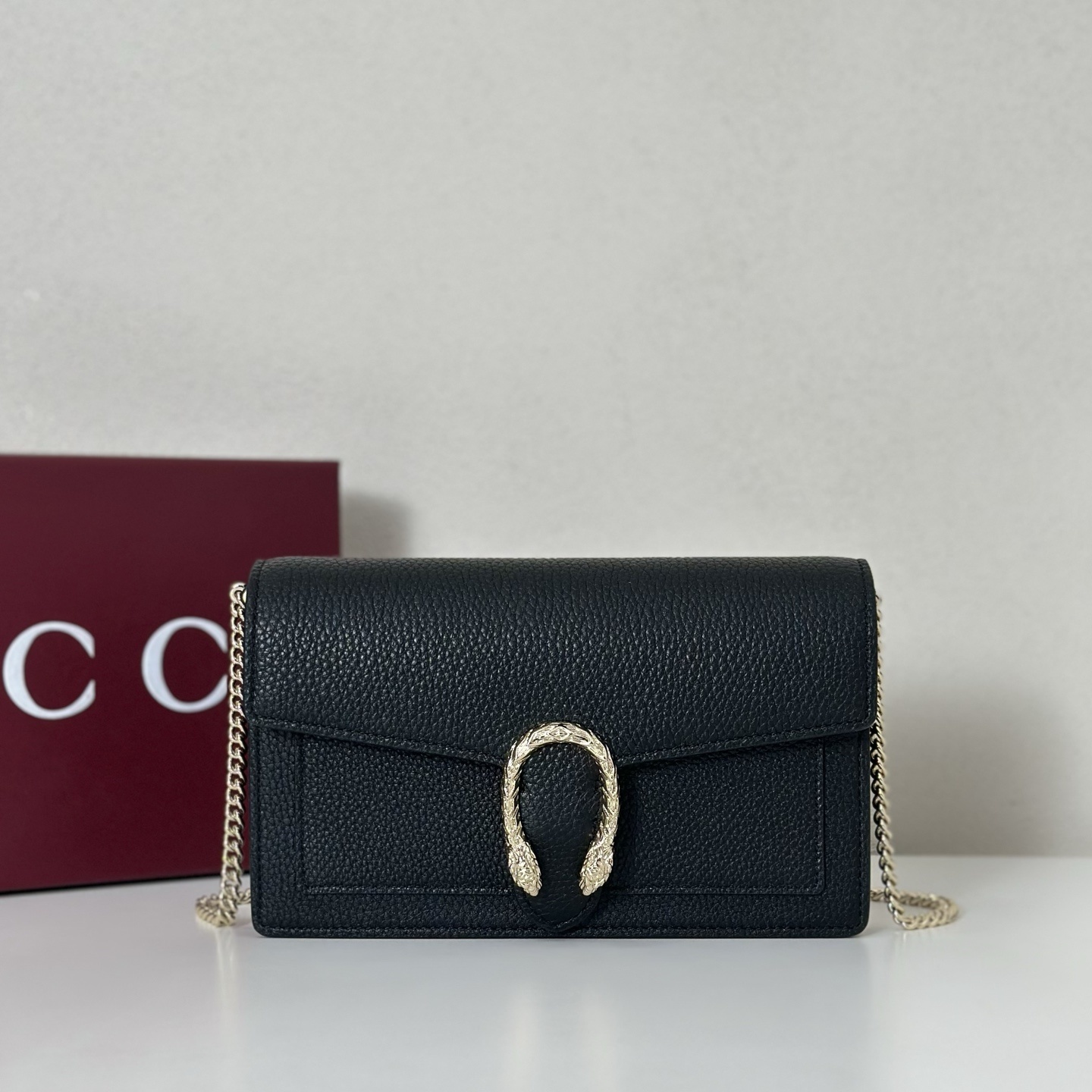 Gucci Dionysus wallet on chain bag in black grainy leather