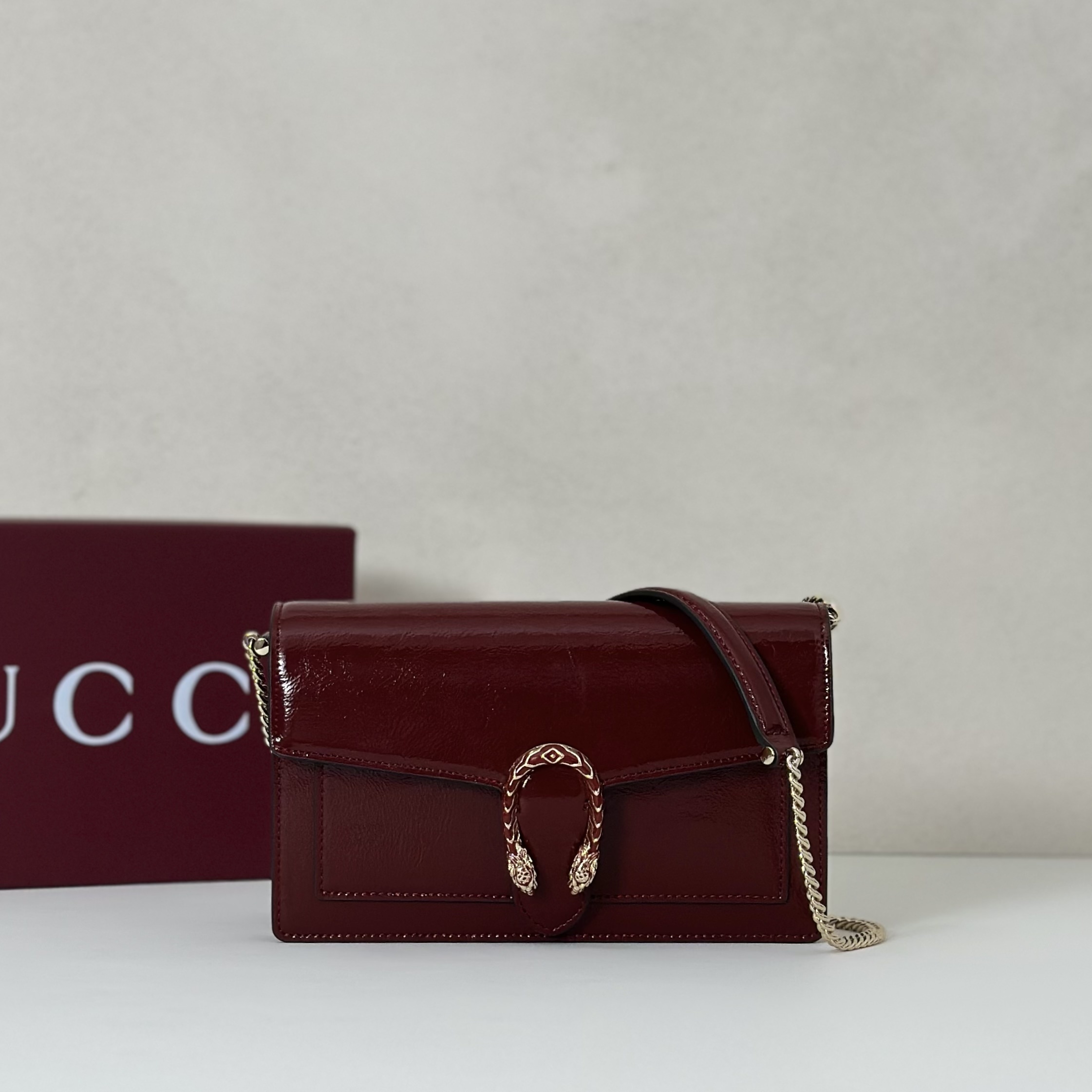 Gucci Dionysus small shoulder bag in blood red or burgundy patent leather