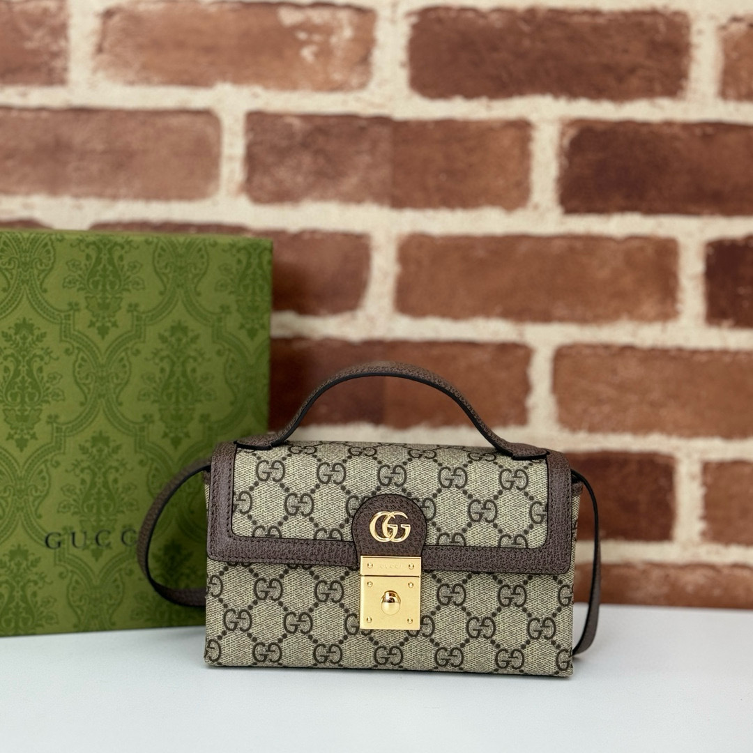 Gucci Ophidia Mini Bag in GG Supreme canvas with a top handle and a lock closure