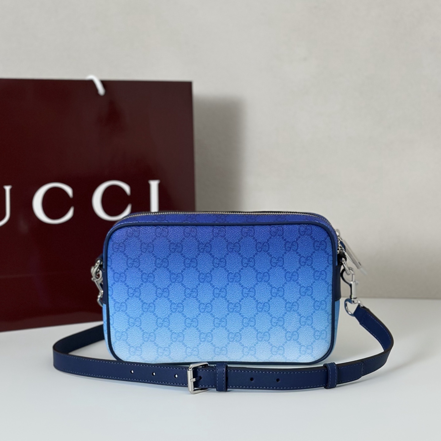 Gucci Chroma small crossbody bag in gradient blue GG Monogram coated fabric with dark blue leather trim