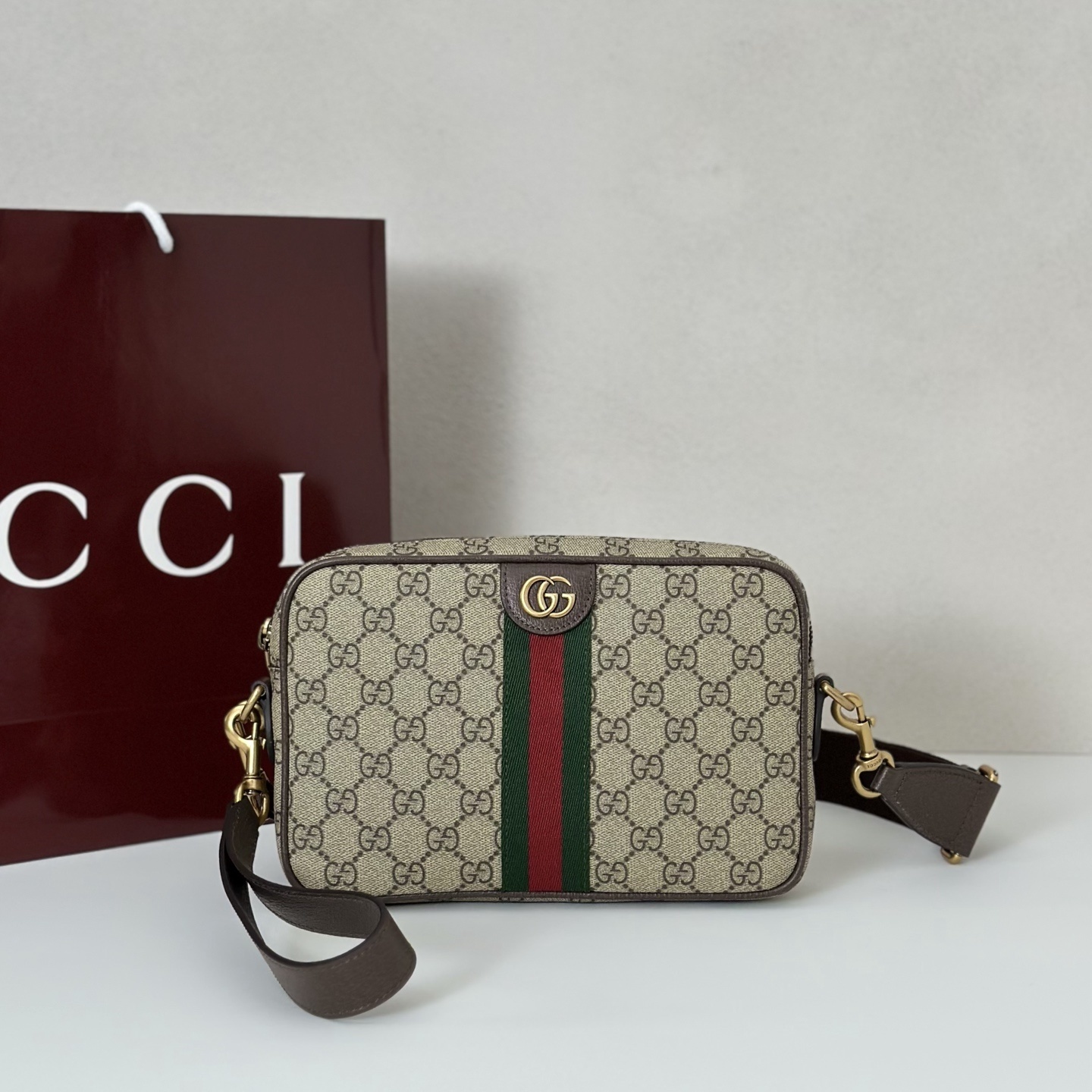 Gucci Ophidia Small Crossbody Bag in GG Supreme canvas with leather trim