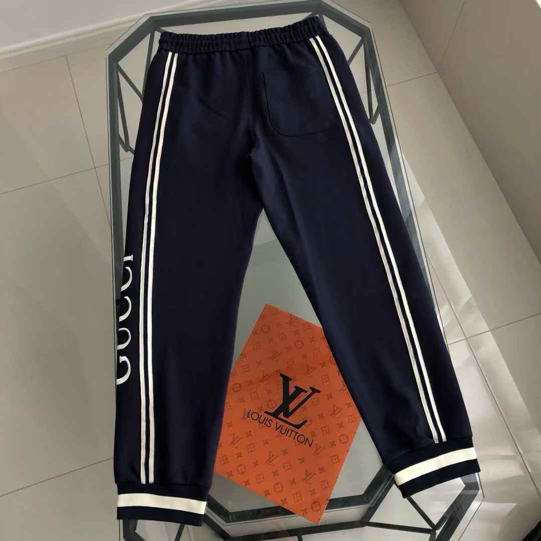 Gucci Technical Jersey Jogging Pants in midnight blue with the Web stripe and logo detail