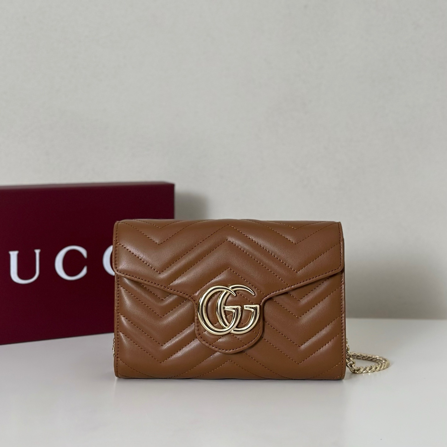 Gucci GG Marmont wallet on chain in brown matelassé chevron leather