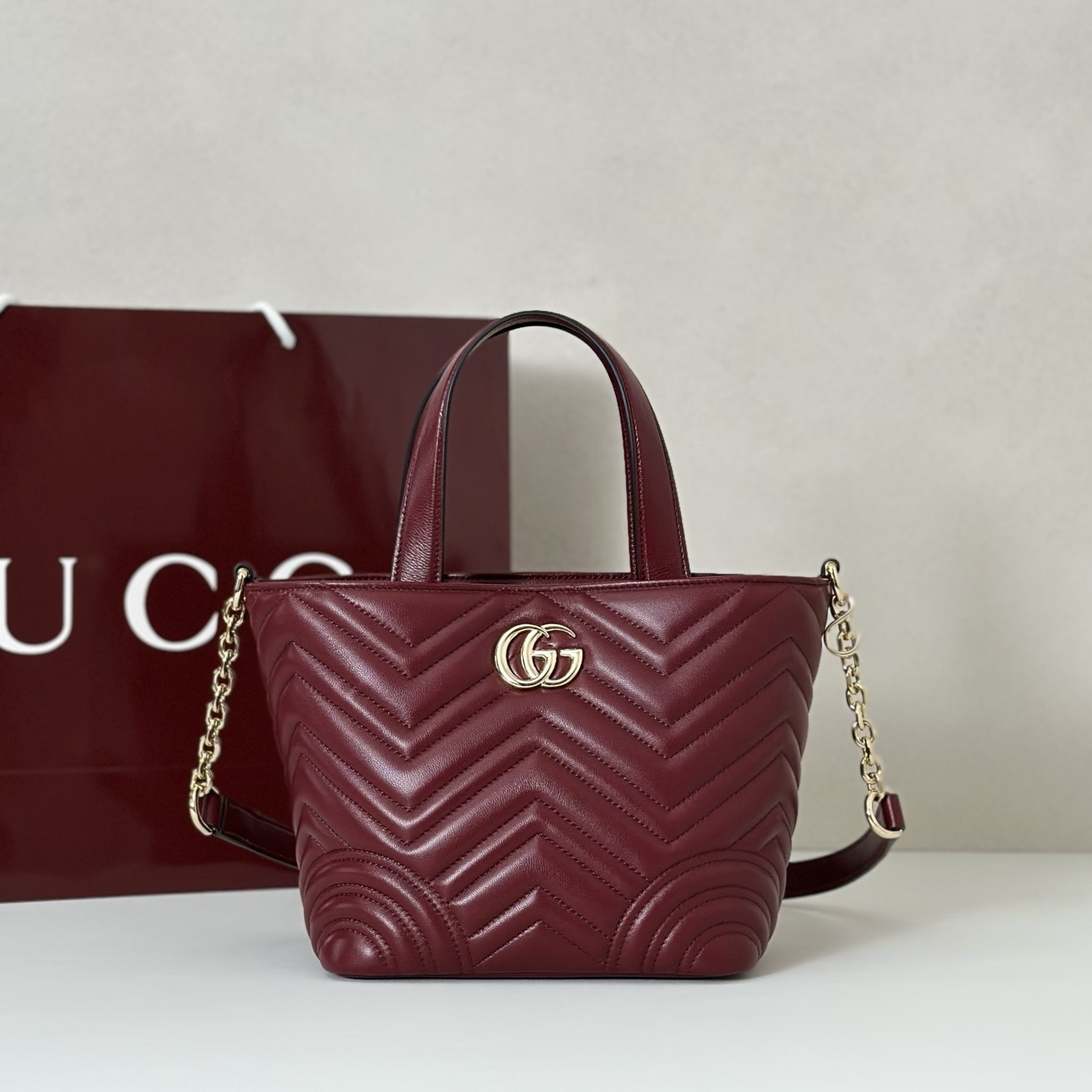 Gucci GG Marmont small tote bag in hibiscus red matelassé leather