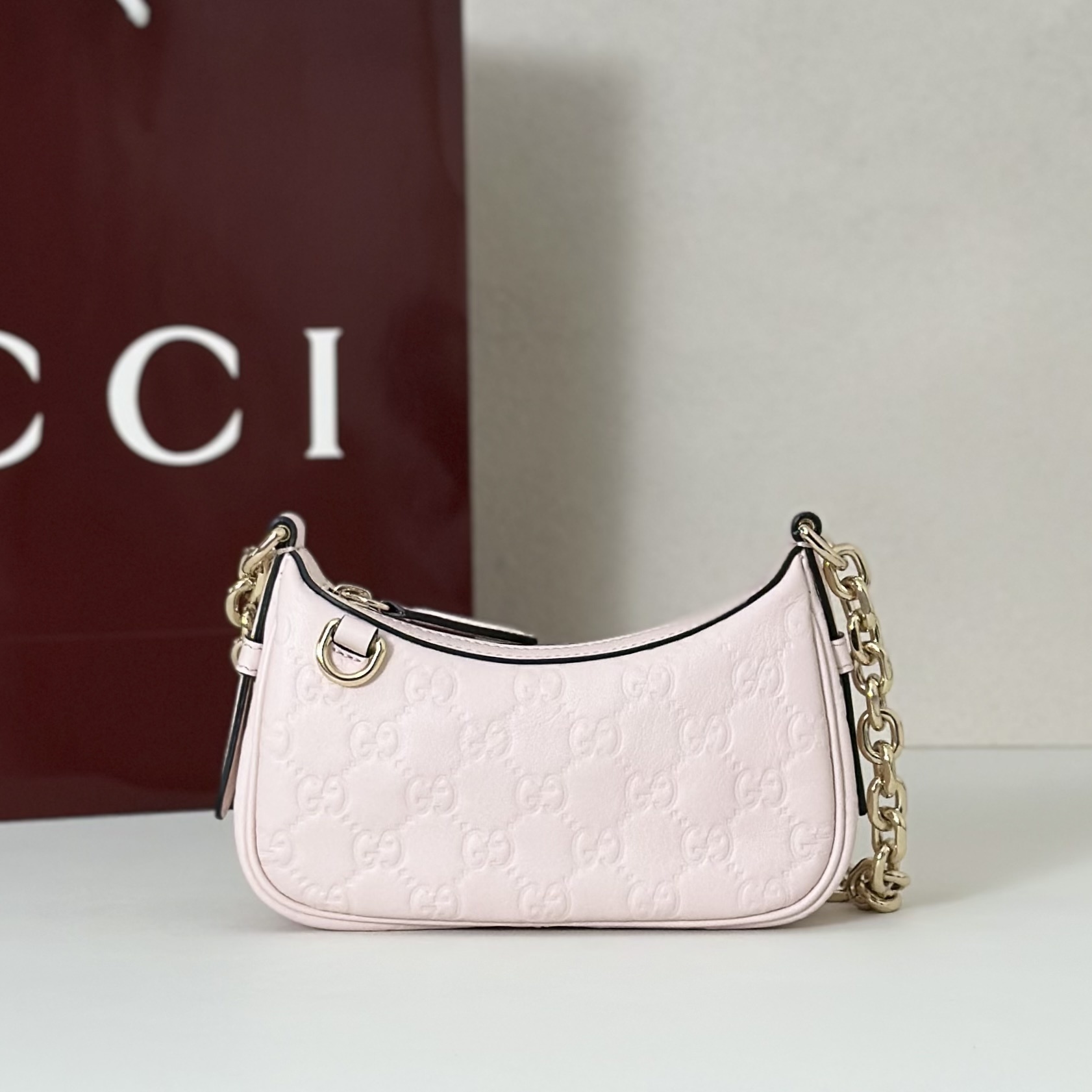 Gucci mini GG matelassé shoulder bag in pink leather