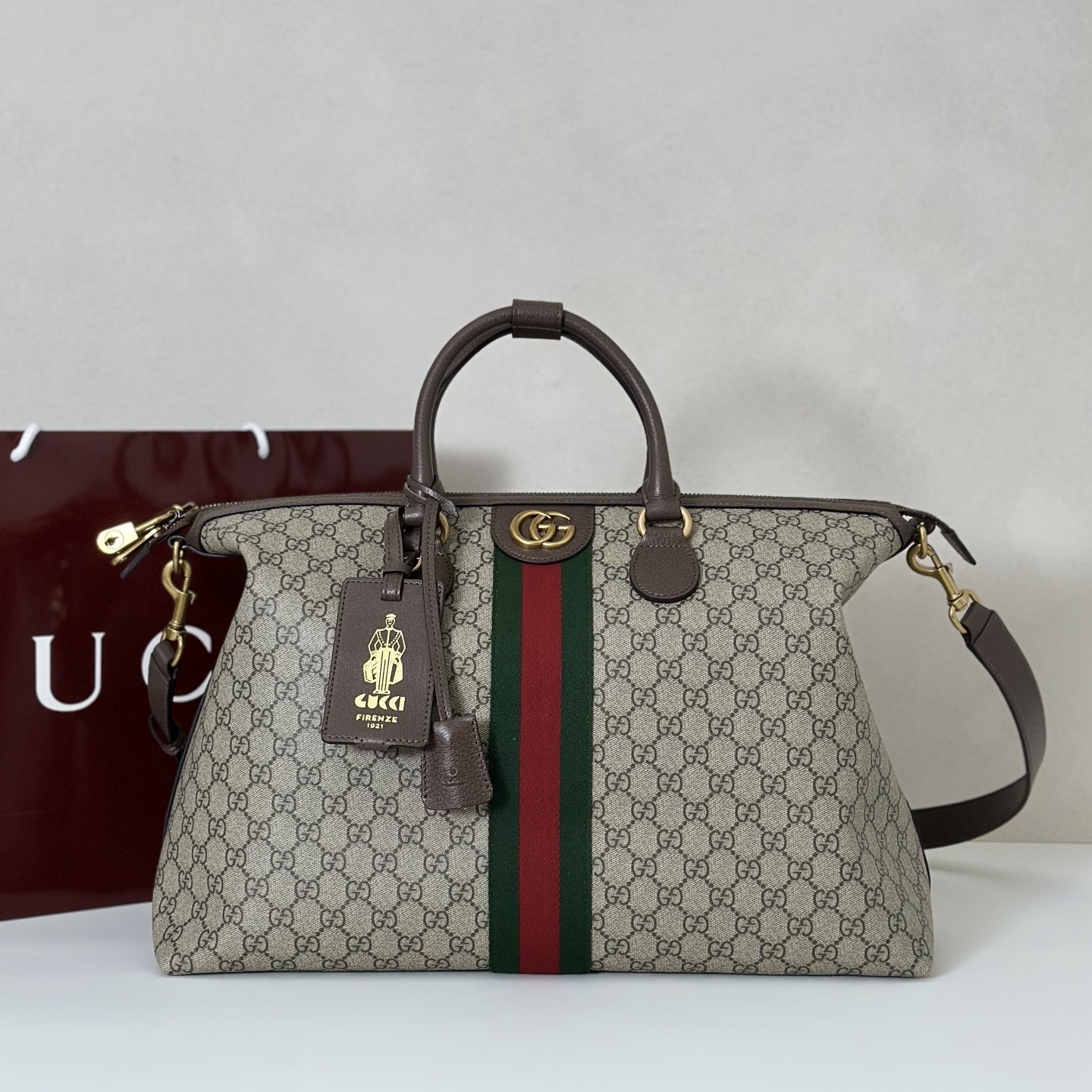 Gucci Savoy medium duffle bag in beige and dark brown GG monogram