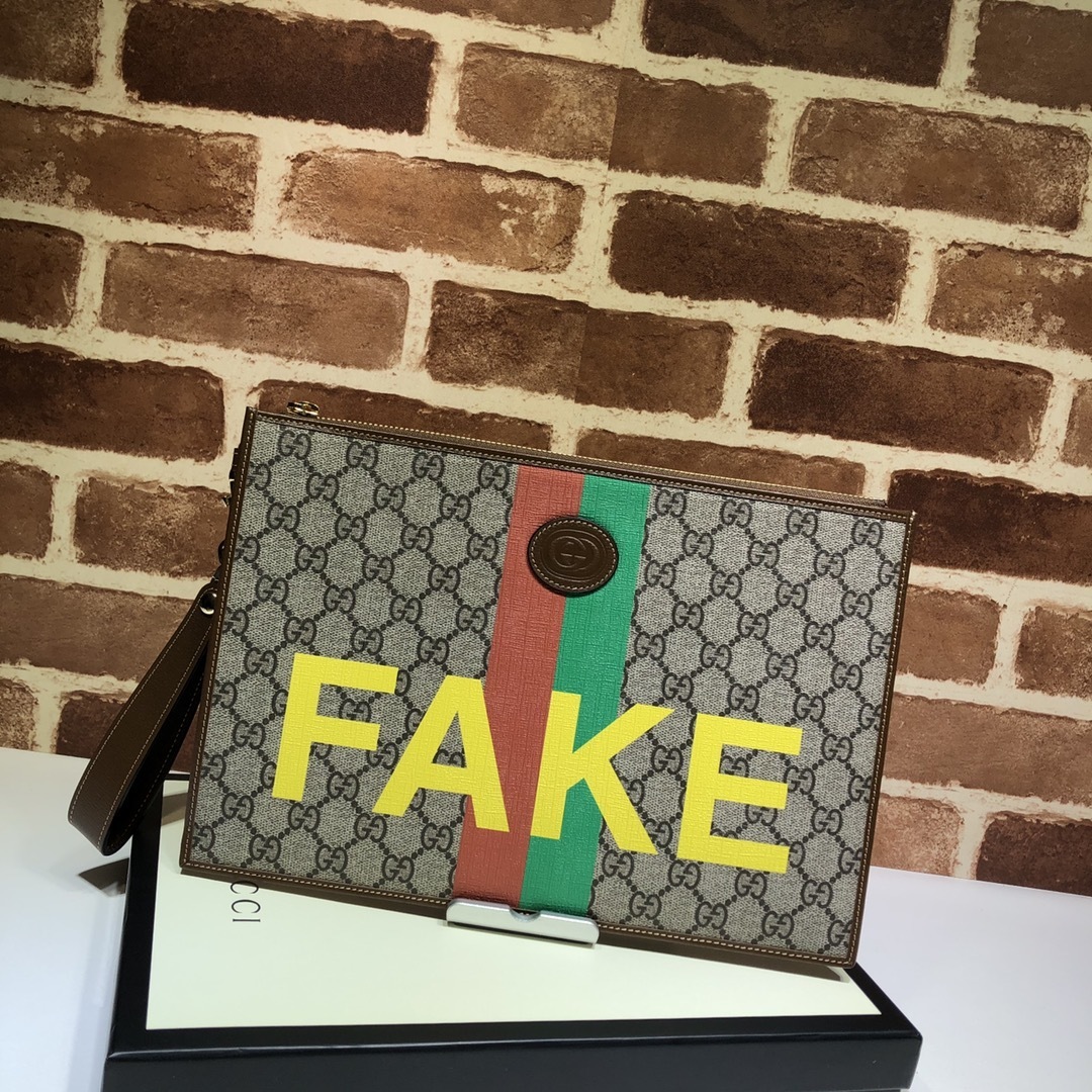 Gucci Ophidia GG Supreme canvas clutch with web stripe and "FAKE" print