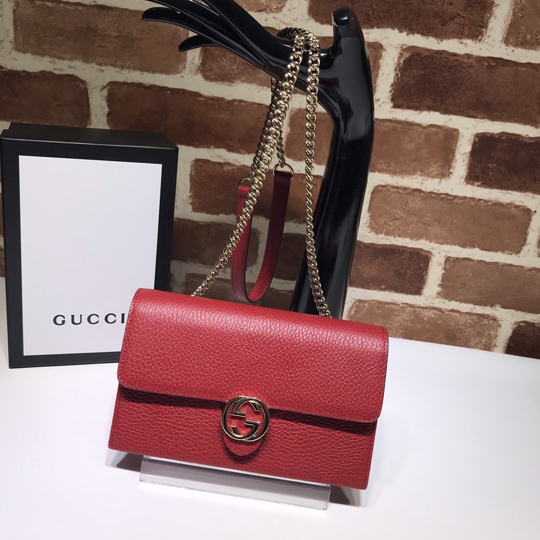 Gucci Interlocking G red leather dollar wallet on a chain crossbody bag