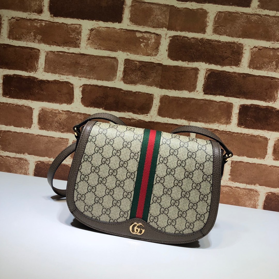 Gucci Ophidia GG small shoulder bag in beige and ebony GG Supreme canvas with brown leather trim, gold-toned hardware, and the signature green and red Web stripe