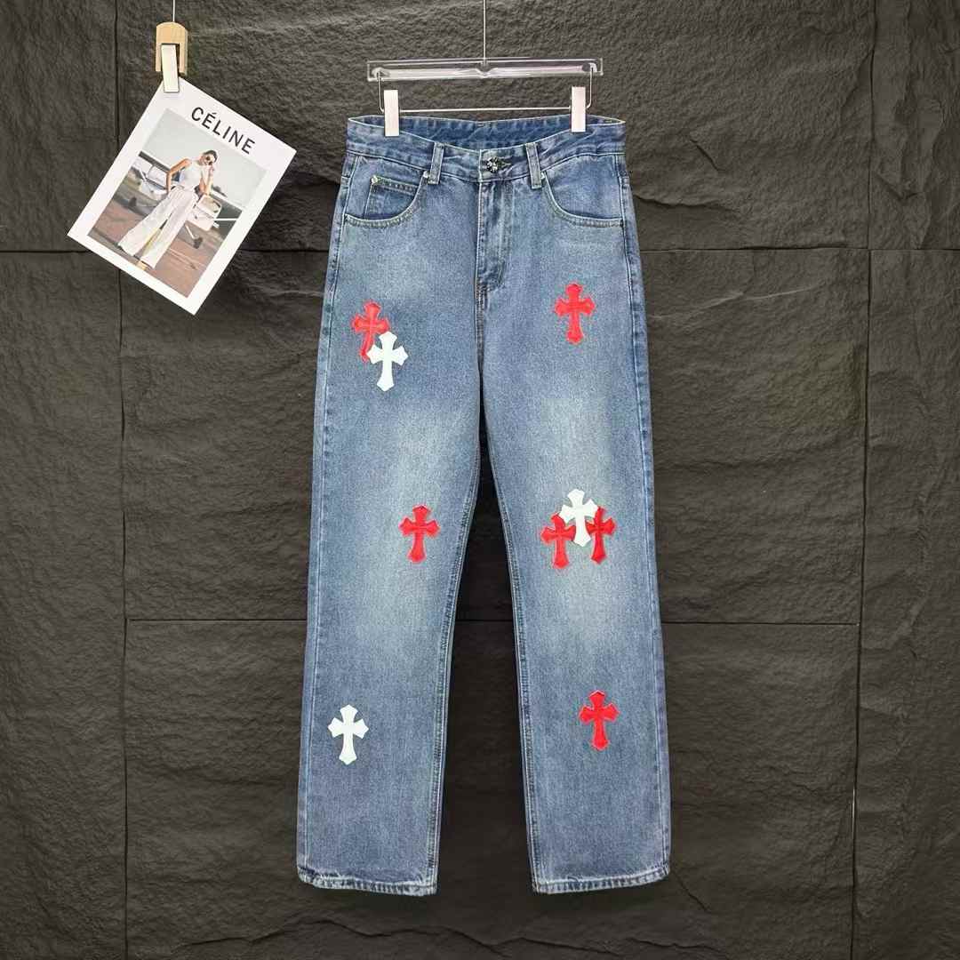 Chrome Hearts straight-leg jeans with red and white cross patches