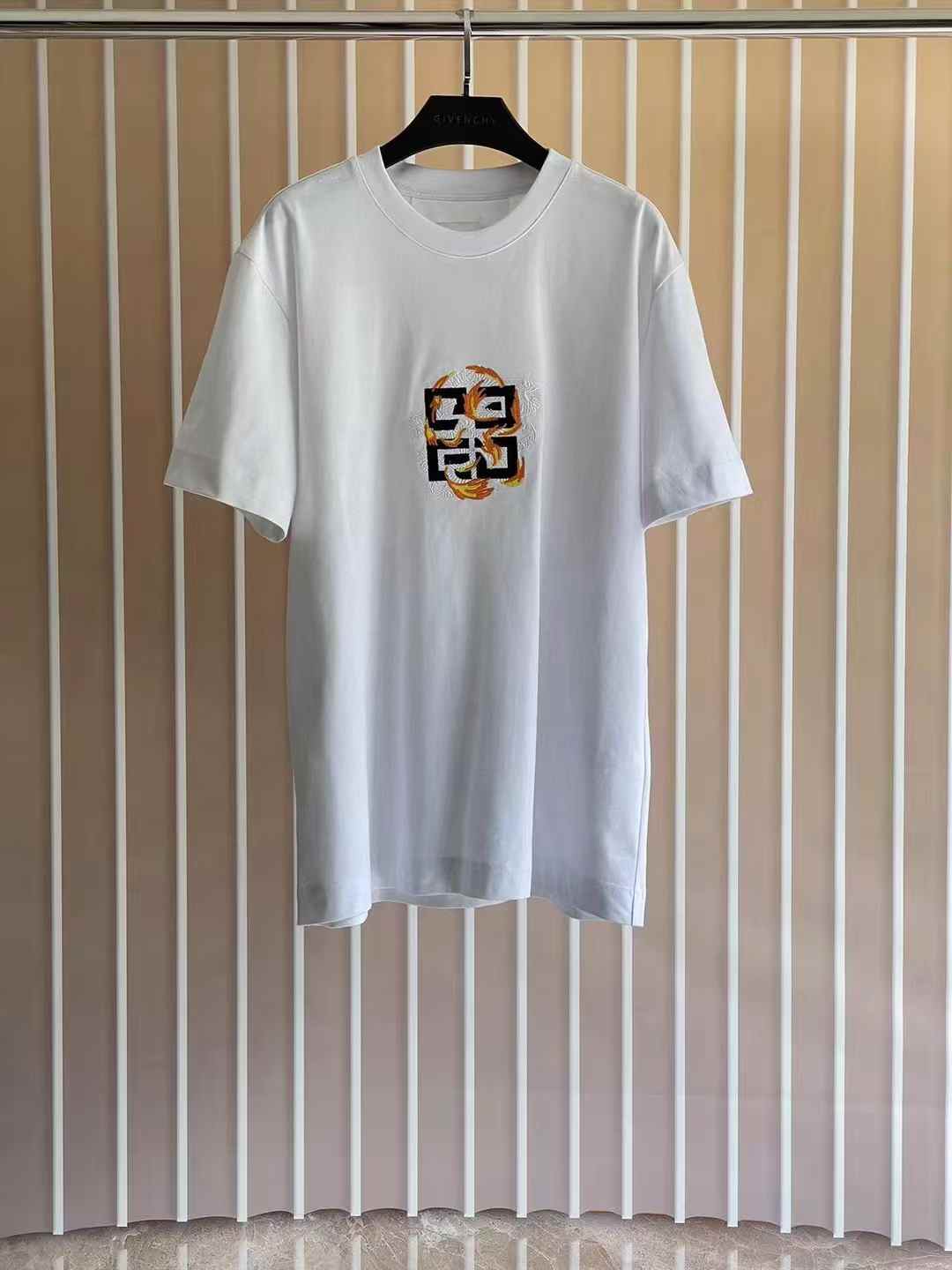 Givenchy cotton T-shirt featuring the signature 4G logo embroidered on the front