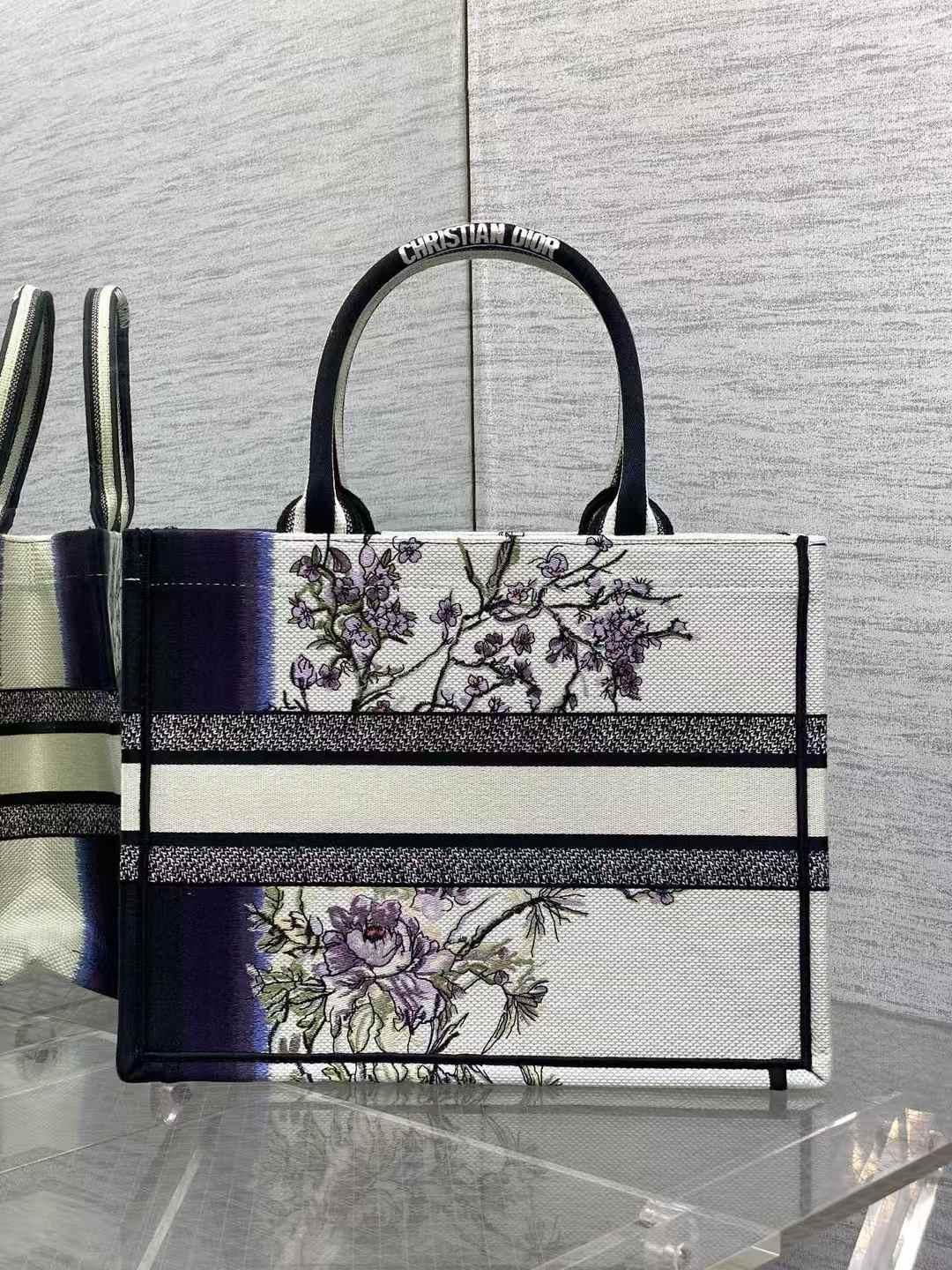 Christian Dior Book Tote is fully embroidered with a floral motif.