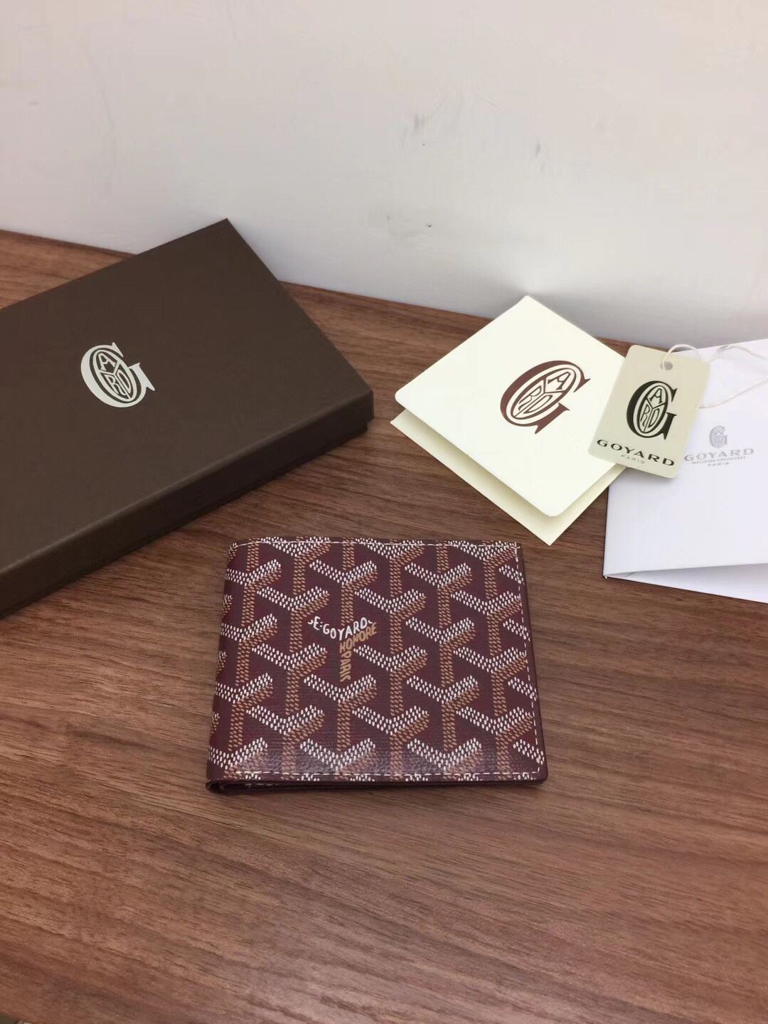 Goyard Victoire bifold wallet in burgundy coated canvas and leather