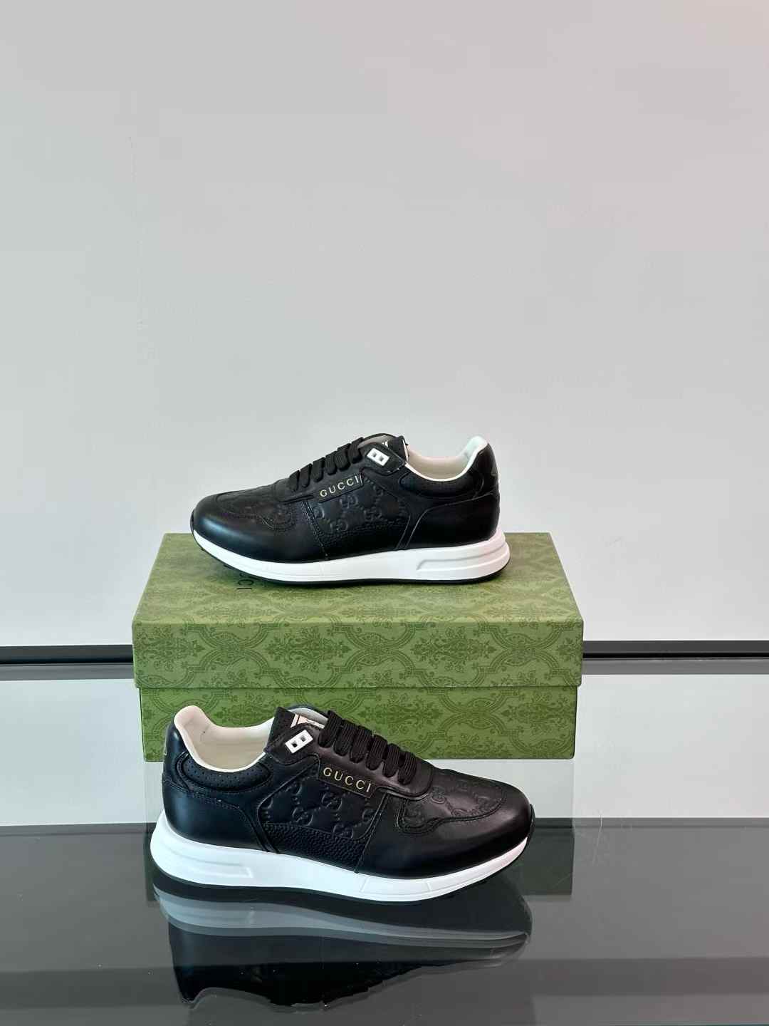 gucci black leather sneakers with a white sole